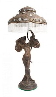 * An Art Noveau Style Figural Lamp Height overall 38 inches.