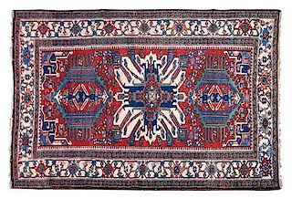 A Persian Karajeh Wool Rug 6 feet 8 inches x 4 feet 8 inches.
