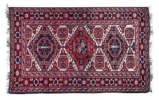 A Persian Ardabil Rug 8 feet 7 inches x 5 feet.