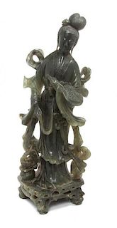 A Carved Hardstone Figure Height 15 1/2 inches.