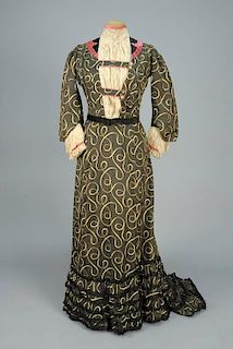 PRINTED SILK HIGH NECK GOWN with LACE TRIM, 1890s.