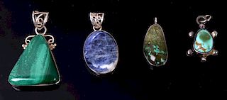 Variety of Four Navajo Multi Stone Silver Pendants