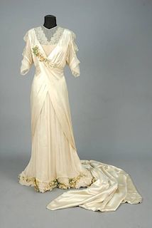 TRAINED SILK WEDDING GOWN with LACE and ORANGE BLOSSOM TRIM, 1920s.