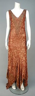 TRAINED METALLIC BROCADE EVENING GOWN, EARLY 1930s.