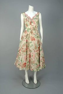 FRANK STARR FLORAL PRINTED PARTY DRESS, 1950s.