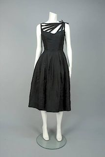 OLEG CASSINI STRAPPY COCKTAIL DRESS, 1950s.
