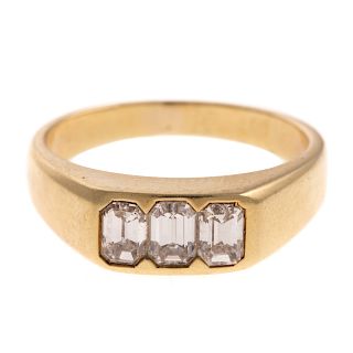 A 3 Stone Emerald Cut Diamond Ring in 18K