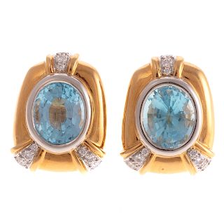 A Pair of Blue Topaz & Diamond Earrings in 18K