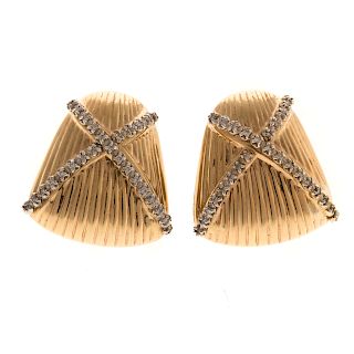 A Ladies Pair of 14K Gold Earrings with Diamonds