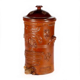 A 19th century English stoneware water barrel.