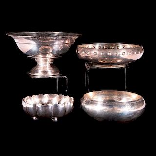 Three sterling bowls and one weighted sterling bowl.