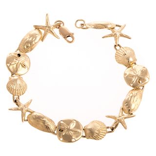 A Ladies Starfish & Seashell Bracelet in 14K Gold