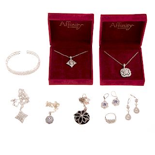 A Collection of Diamond & Sterling Silver Jewelry