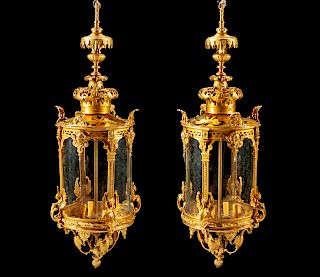 A Pair of Régence Style Gilt Bronze and Glass Lanterns 