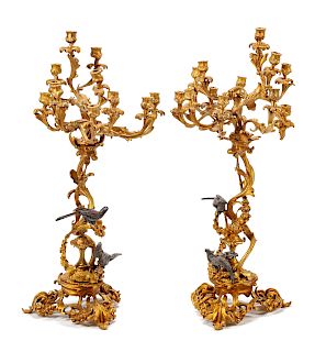 A Pair of Louis XV Style Gilt and Patinated Bronze Twelve-Light Candelabra 