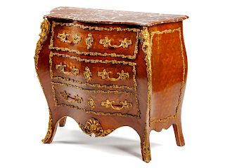 A French Gilt Bronze Mounted Parquetry Chest of Drawers