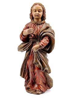 A Spanish Carved and Polychromed Wood Santos Figure 