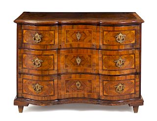 A Continental Walnut and Marquetry Commode