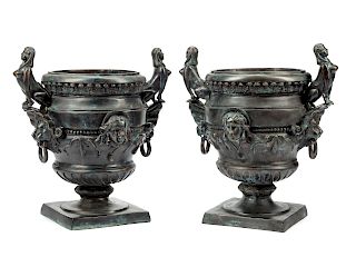 A Pair of Egyptian Revival Patinated Metal Planters 