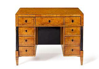 A Biedermeier Birch Kneehole Desk