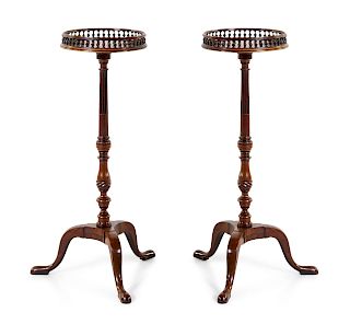 A Pair of George III Mahogany Torchères