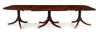 A George III Mahogany Triple-Pedestal Dining Table