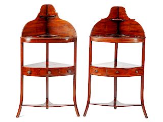 A Near Pair of George III Mahogany Corner Stands 