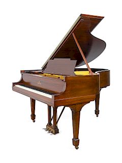 A Steinway &amp; Sons Mahogany Baby Grand Piano