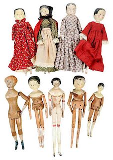Nine Antique Carved Wood Dolls