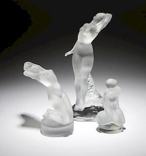 A group of three Lalique art glass nudes
