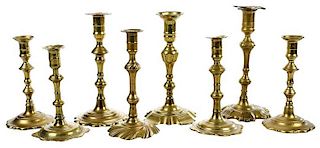 Eight Georgian Brass Candlesticks