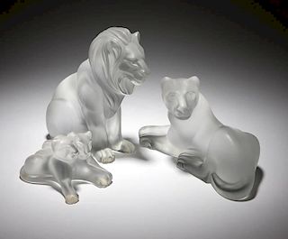A group of three Lalique art glass lion figures
