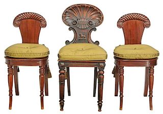 Three Georgian Carved Mahogany Hall Chairs