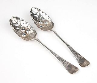 A pair of George II sterling silver repousse spoons