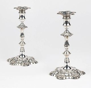 A pair of George II sterling silver candlesticks