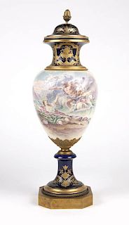 A Sevres style gilt bronze-mounted lidded urn