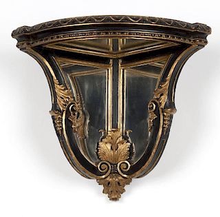 A mirrored gilt and black lacquer corner wall bracket