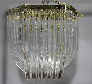 MIDCENTURY. Lucite And Gilt Metal Chandelier .