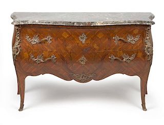 A Louis XV style marquetry commode