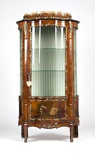 A Louis XV style gilt bronze-mounted vitrine cabinet