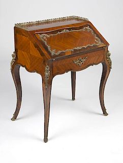 A Louis XV style gilt bronze-mounted bureau en pente
