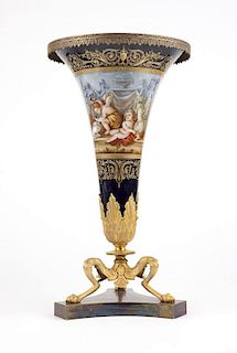 A gilt bronze-mounted Sevres style trumpet vase