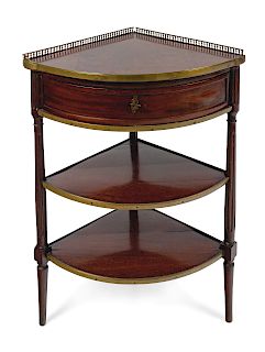 A French Brass Mounted Mahogany Corner Table