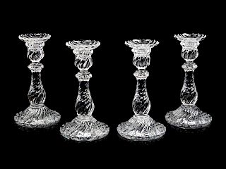A Set of Four Molded Glass Candlesticks