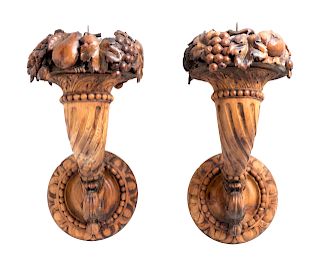 A Pair of Continental Carved Fruitwood Sconces