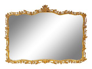A Black Forest Style Giltwood Mirror
