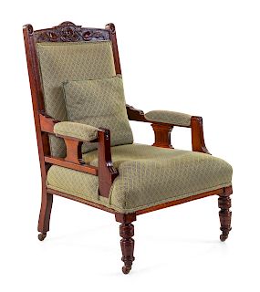 An Anglo-Indian Carved Hardwood Armchair