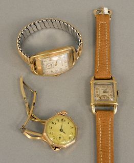 Three vintage gold filled wristwatches including Waltham and Bulova.
