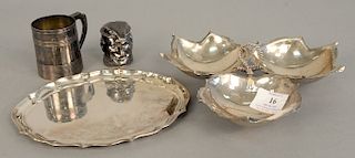 Sterling silver lot to include a three part dish, mug, small tray, and a figural covered face. 20 troy ounces.