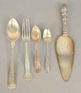 Sterling silver lot to include a set of spoons and one Russian silver spoon. 42.9 troy ounces